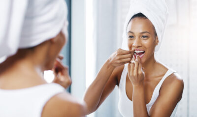 flossing woman